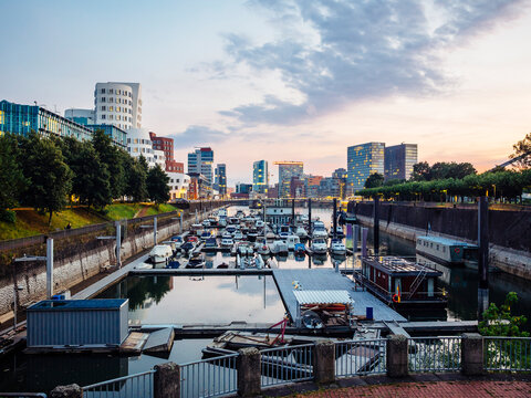 Germany, Dusseldorf, view to media harbor with city harbour in the foreground