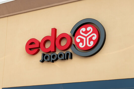 Calgary, AB, Canada. Sep 2, 2026. Exterior logo sign for Edo Japan restaurant mounted on a building wall at low angle view.