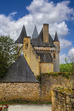 Chateau de Clerans in Saint-Leon-sur-Vezere, France. Historical medieval stone castle under daylight