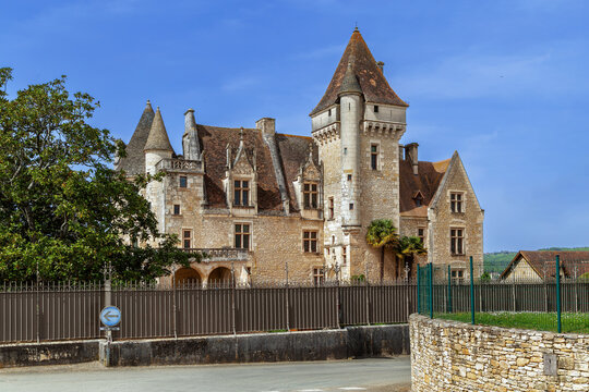 Chateau des Milandes in France, frontal scenic view. Late gothic architecture style