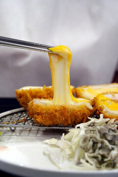 Crispy Japanese cheese tonkatsu pork cutlet filled with melted mozzarella and cheddar cheese