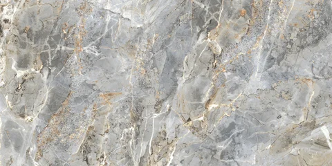 Grey marble texture with subtle yellow veining and natural stone details. Elegant surface for ceramic tiles, interior walls, flooring, and architectural design.  © Vidal