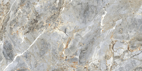 Grey marble texture with subtle yellow veining and natural stone details. Elegant surface for ceramic tiles, interior walls, flooring, and architectural design.  © Vidal