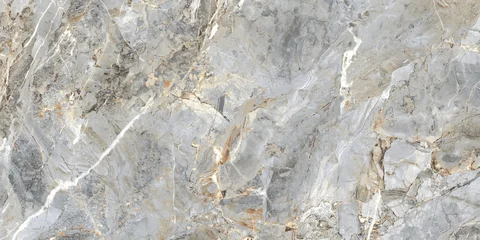 Grey marble texture with subtle yellow veining and natural stone details. Elegant surface for ceramic tiles, interior walls, flooring, and architectural design.  © Vidal