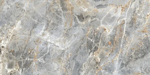 Grey marble texture with subtle yellow veining and natural stone details. Elegant surface for ceramic tiles, interior walls, flooring, and architectural design.  © Vidal