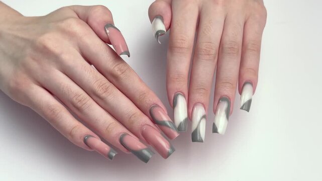 Woman showing elegant french manicure nail art design