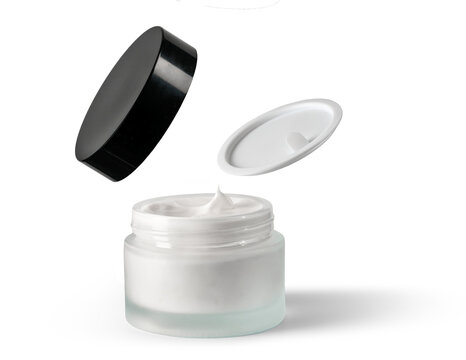 Open jar of white cosmetic cream with floating lid and inner seal over white background, with cream, cosmetic