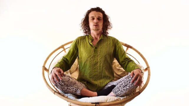 Full Body Man Meditating in Spiritual Mindfulness Pose on Circular Seat
