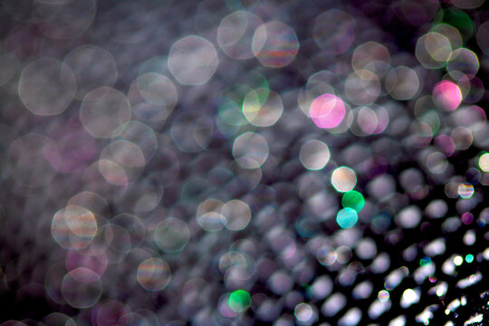 Bokeh sparkly festive black gothic glitter style background sexy fishnet tights