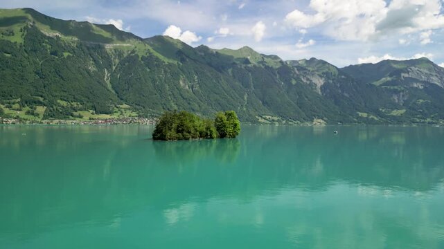 Scenic Lake Brienz panorama with Iseltwald island in Switzerland