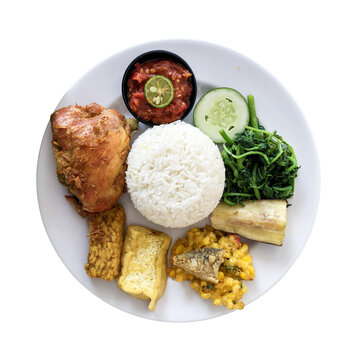 sego tempong. a traditional Banyuwangi, Indonesia dish served on a plate with a transparent background. shot with high angle view