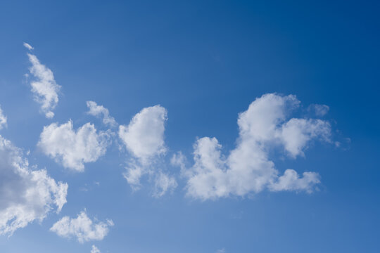 Sky Blue Background With Clear Day And Abstract White Clouds, Bright Natural Cloudscape Fresh Outdoor Atmosphere For Spring Summer Landscape,Weather Banner, Heaven Scene Autumn Winter Seasonal Design.