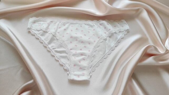 Women's cotton panties with lace trim and delicate patterns. Comfortable underwear for daily wear