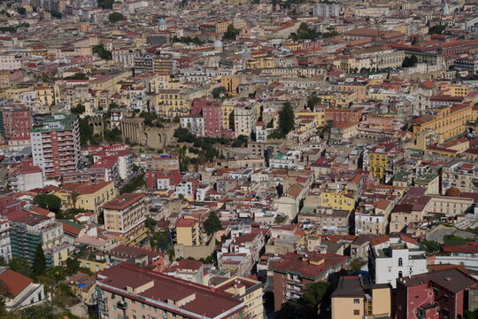 Panoramic view of the dense urban architecture of Naples, Italy. Aerial view of the roofs of residential buildings. 