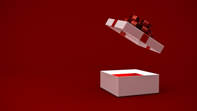 Blank white present box open or gift box with red ribbons and bow isolated over dark red background with light coming out of the box and blank copy space minimal conceptual 3D rendering
