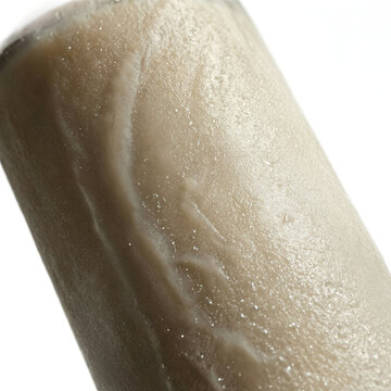 Macro texture details of luxurious sheer lotion containing Pongamia pinnata extract, isolated on a transparent background.