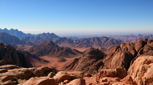 Breathtaking Panoramic View of the Rugged Sinai Mountains and Desert Valleys under a Clear Blue Sky, Egypt