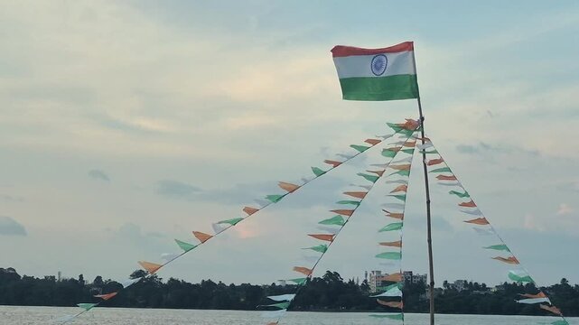 Video of Indian flag waving on a ferry boat at Kolkata.	