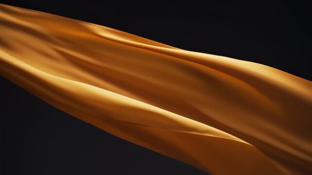 Golden Fabric Flowing Against Black Background.