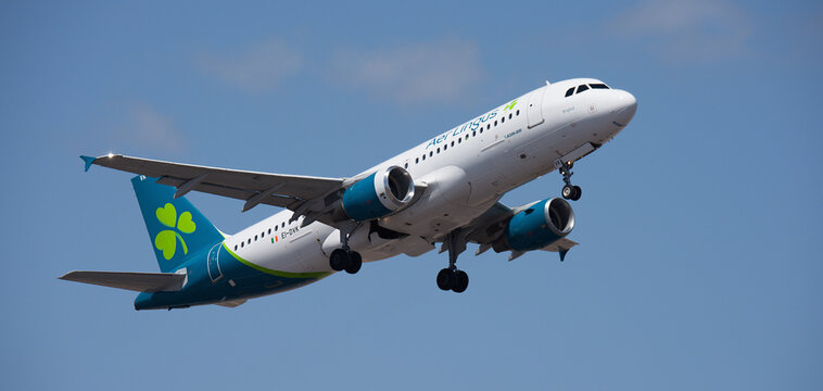 Tenerife, Spain august 29st, 2026. Airbus A320-214 Aer Lingus airlines, flies in the blue sky. Takeoff at Tenerife Airport. Retracting the landing gear