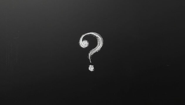 Question mark drawn in chalk on a blackboard