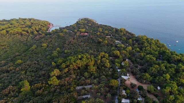 FKK Naturist Baldarin Campsite In Punta Kriza On Cres Island, Croatia, Aerial Drone Shot A Beautiful Summer Evening. Campervans, Motorhomes, Coastal Nature, Crystal Clear Adriatic Sea, Scenic Bays