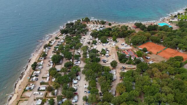 FKK Camping Ulika Near Porec With Campervans Aerial Drone View During A Sunny Summer Day On The Beautiful Adriatic Coast In Istria Croatia
