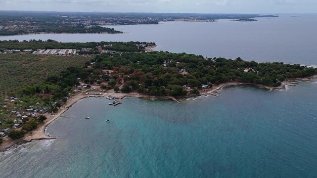 FKK Camping Ulika Near Porec With Campervans Aerial Drone View During A Sunny Summer Day On The Beautiful Adriatic Coast In Istria Croatia