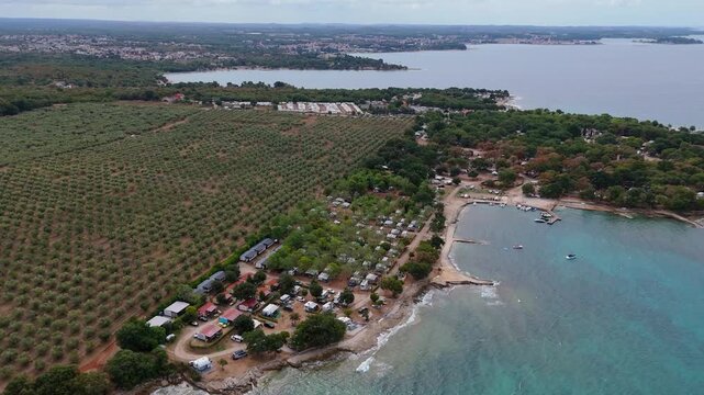 FKK Camping Ulika Near Porec With Campervans Aerial Drone View During A Sunny Summer Day On The Beautiful Adriatic Coast In Istria Croatia