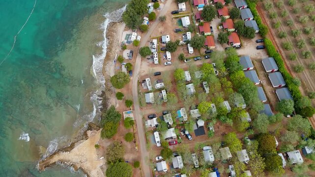 FKK Camping Ulika Near Porec With Campervans Aerial Drone View During A Sunny Summer Day On The Beautiful Adriatic Coast In Istria Croatia