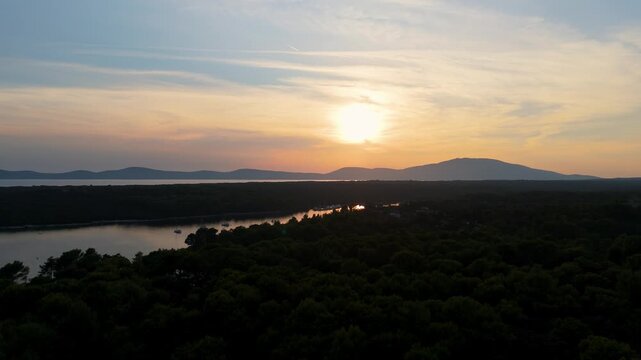 FKK Naturist Baldarin Campsite In Punta Kriza On Cres Island, Croatia, Aerial Drone Shot A Peaceful Beach At Sunset, Campervans, Motorhomes, Coastal Nature, Crystal Clear Adriatic Sea, Scenic Bays