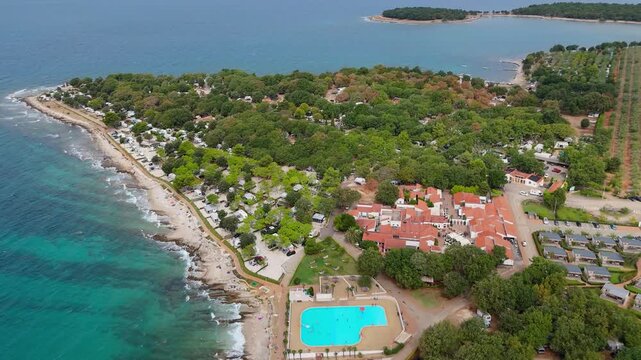 FKK Camping Ulika Near Porec With Campervans Aerial Drone View During A Sunny Summer Day On The Beautiful Adriatic Coast In Istria Croatia