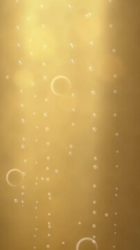 Golden liquid with rising bubbles