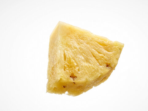 Fresh sweet juicy pineapple wedge isolated on white background