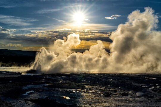 Clepsydra Geyser at sunset in the Lower Geyser Basin in Yellowstone National Park in the USA