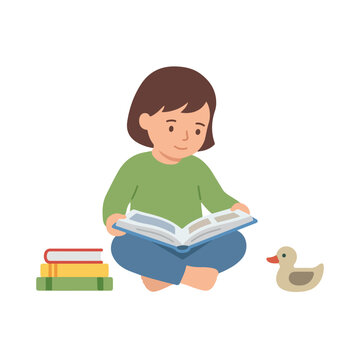 A young girl sits cross-legged on the floor, reading an open book next to a stack of books and a toy duck.