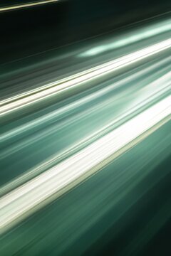 Abstract streaks of light in green and white motion