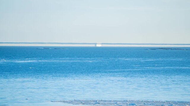 View of Fata Morgana mirage over the Gulf of Finland, showing a timelapse of the atmospheric phenomenon. Helsinki, Finland.