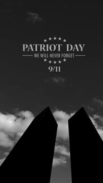 Silhouette of Towers on background of black and white sky. 09.11.2001 American Patriot Day video. Vertical video with inscription for social media and stories.