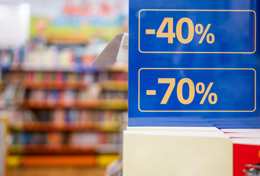 Blue promotional signs with price reductions