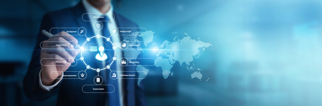 Corporate strategist reviewing business plans pointing toward Management Consulting strategies over the global network ecosystem. Expert advisory partnerships maximize enterprise profitability.