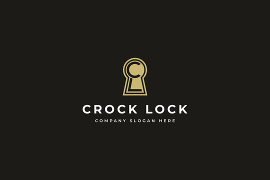 Gold keyhole logo design with typography on black background for corporate branding and business identity template