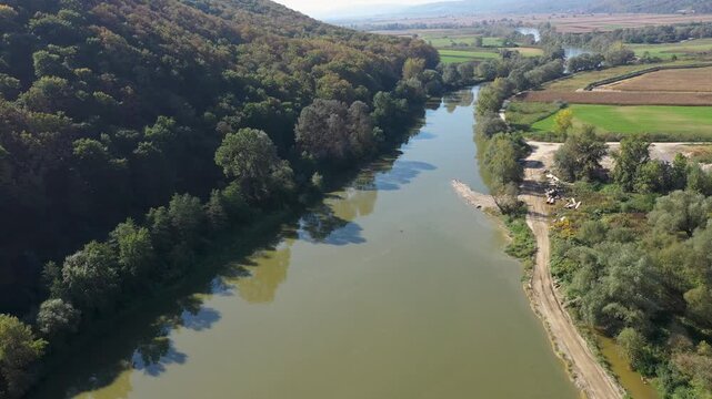  Flying over a river flowing in a gorge aerial view