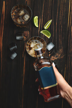 Whiskey Bottle with Ice and Lime