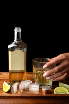 Whiskey Bottle with Ice and Lime