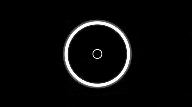 Minimalist white circular loading video on black background