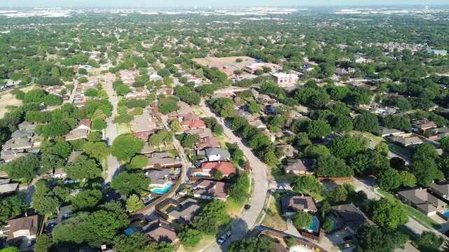 Sinuous roadway networks weave past shaded homestead boundaries across growing NTX parcels. Tidy lawns embrace welcoming family residences across classic Coppell, Texas