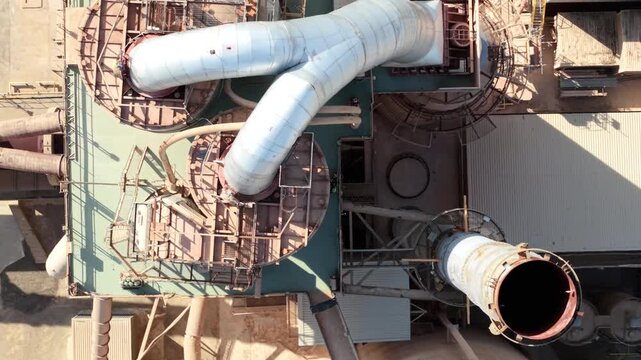 Close up aerial view of cyclone preheater tower and exhaust stack at cement works in Ketton UK