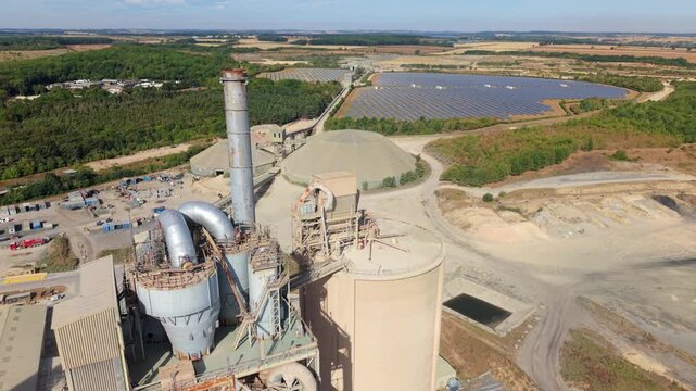 Close up aerial view of cyclone preheater tower and exhaust stack at cement works in Ketton UK