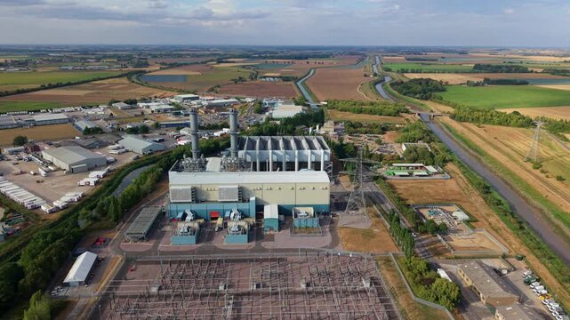 Aerial view of gas turbine power station building and electrical substation in Spalding UK
